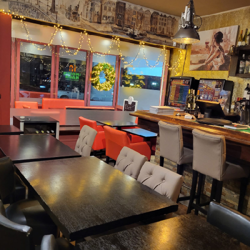 Geniet van een ongedwongen eetervaring bij Indian Naan Restaurant